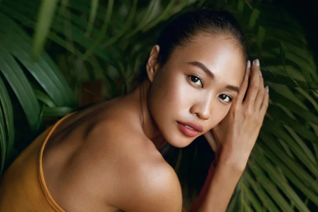 Beauty face. Woman model with natural makeup and skin in nature